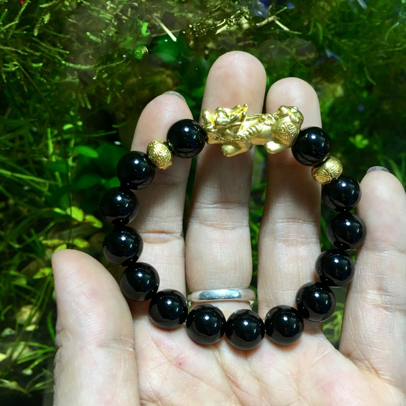 Vòng đá tektit mix charm vàng 24k
