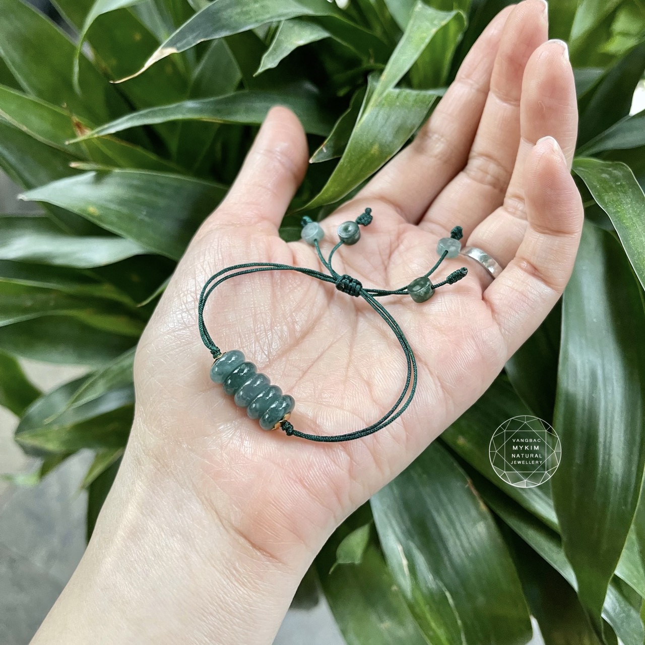 Dây tết Ngọc Phỉ Thúy băng dầu mix cánh hoa vàng 10k